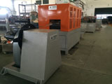 Brick-mesh recoiling machine