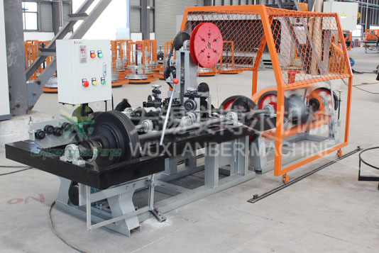 High speed barbed wire machine