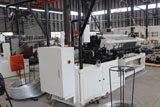 Chain link weaving machine